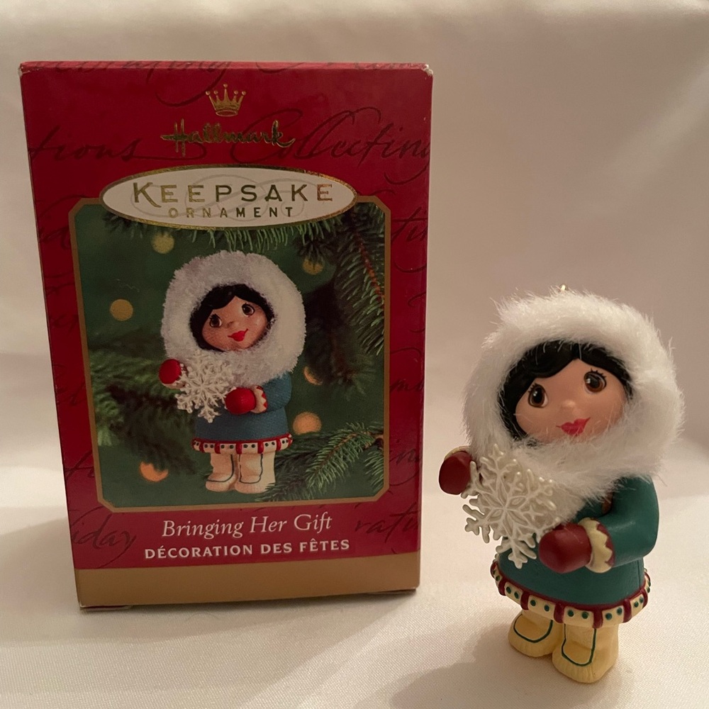 Hallmark Ornament - Girl in Teal and White with Red Accents. EUC in original box